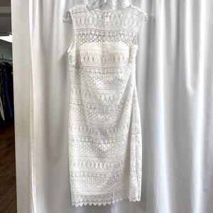 Short dress with textured lace and small white beads